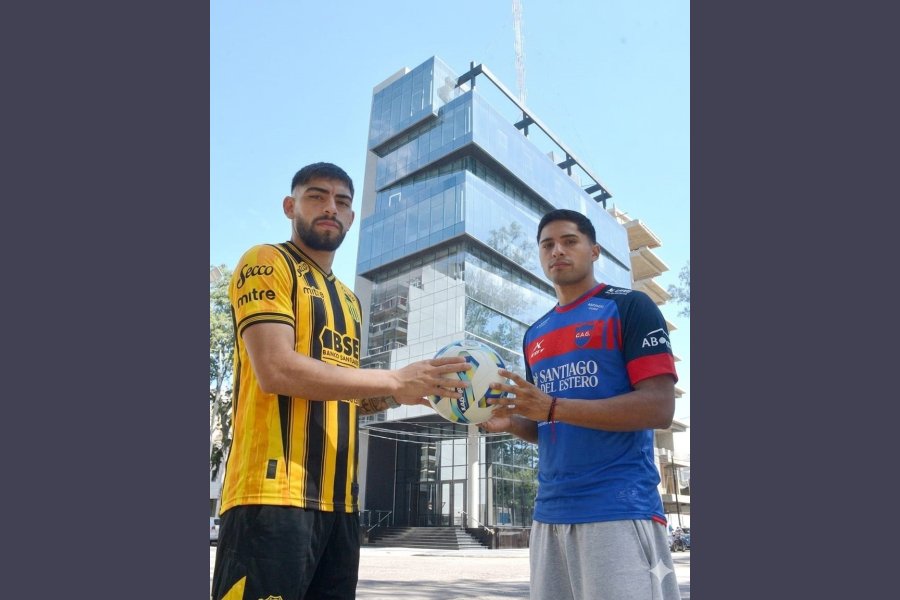 Ferreyra y Véliz con el nuevo edificio de fondo. T