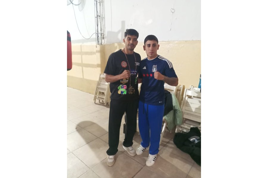 Santill{an y Rueda, posan para la prensa.